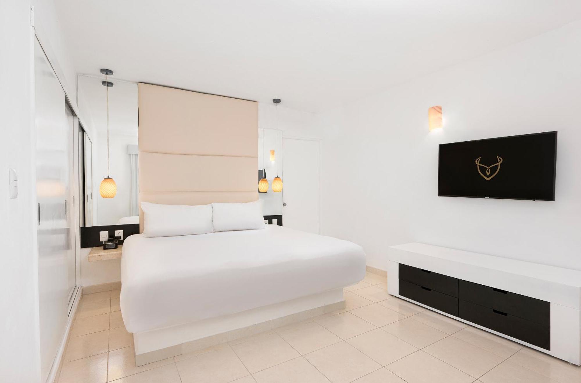 Quarto Deluxe Relax com vista da piscina